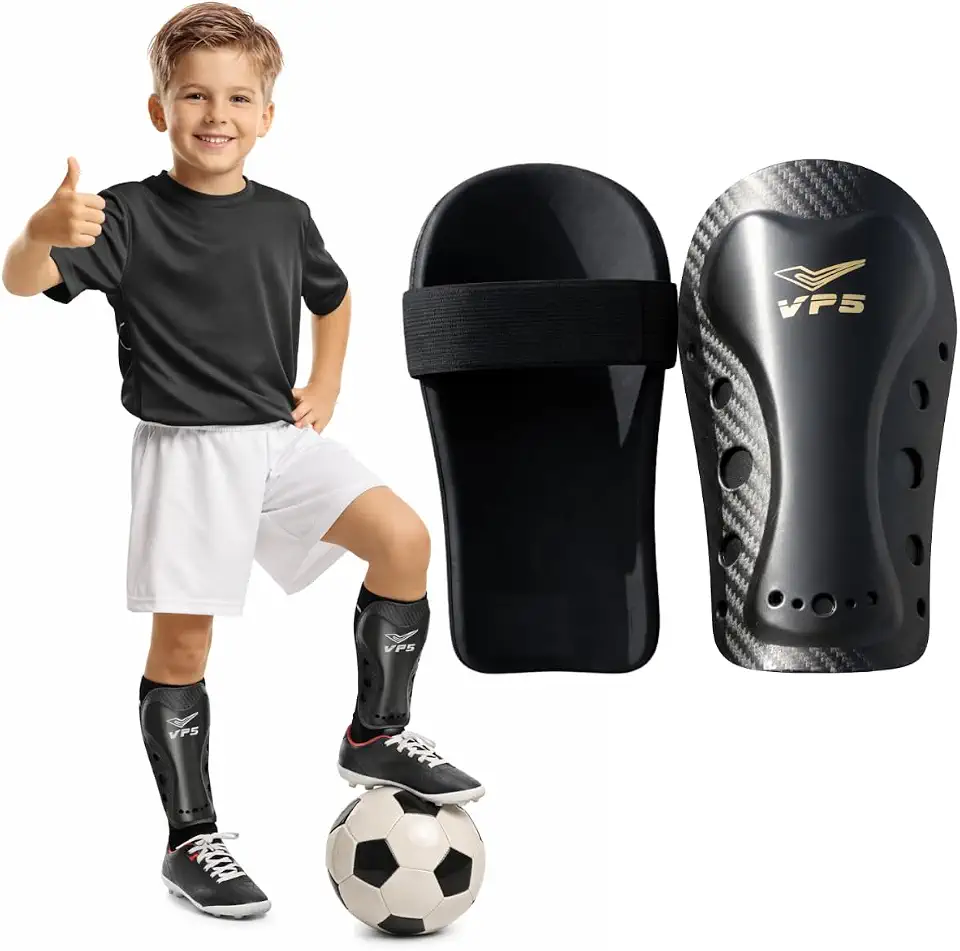 Caneleira Infantil Futebol Futsal Society Com Elástico Um Par Ótimo Ajuste Treino Leve e Confortável Proteção Tamanho Único 15cm Cores Preta Branca Azul Vermelha