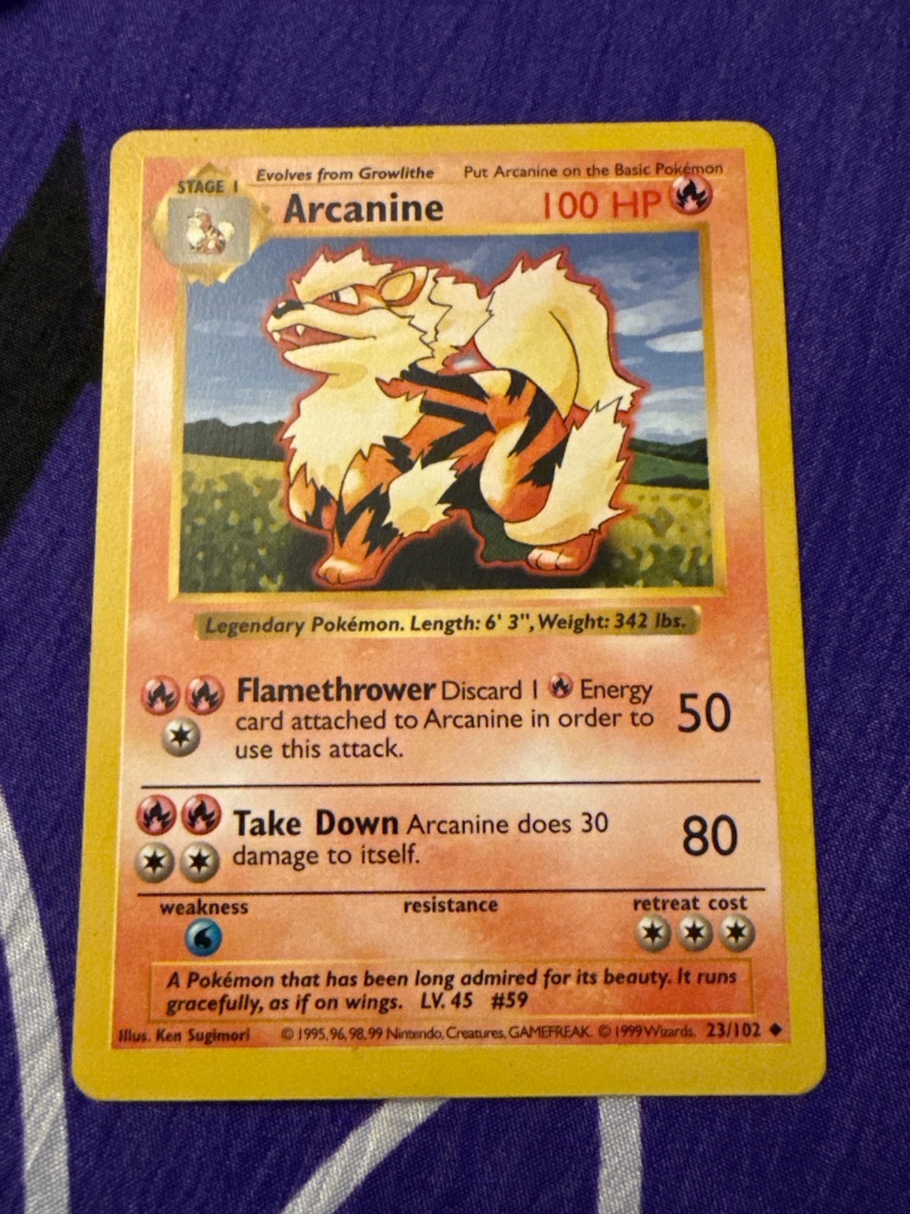 Arcanine (23/102) Base Set Pokémon TCG — Damaged, Usado