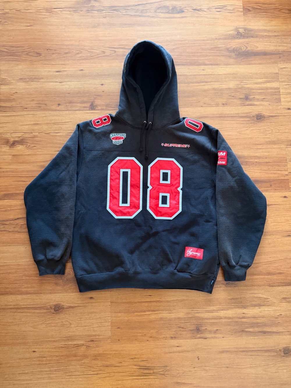 Moletom Supreme Football Jersey Black SS26-W18 — XG, Novo